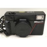 Quality collectible Nikon L35 AF 35mm compact film camera. Untested but in good cosmetic condition