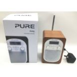 PURE EVOKE DIGITAL RADIO. This is model number D2. A small portable digital and FM radio complete
