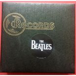 BLACK RECORD FOLDER. A great folder in Ex condition here housing 20 various Beatle singles on the