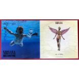 NIRVANA LP RECORDS X 2. First we have a clear vinyl copy of 'In Usero' followed by the iconic