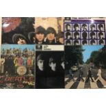 BEATLES VINYL LP RECORDS. Here we have 6 original Beatles albums on the Yellow / Black Parlophone