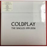 COLDPLAY THE SINGLES 1999-2006 BOXSET. This limited edition set has 15 x 7" heavyweight Vinyl