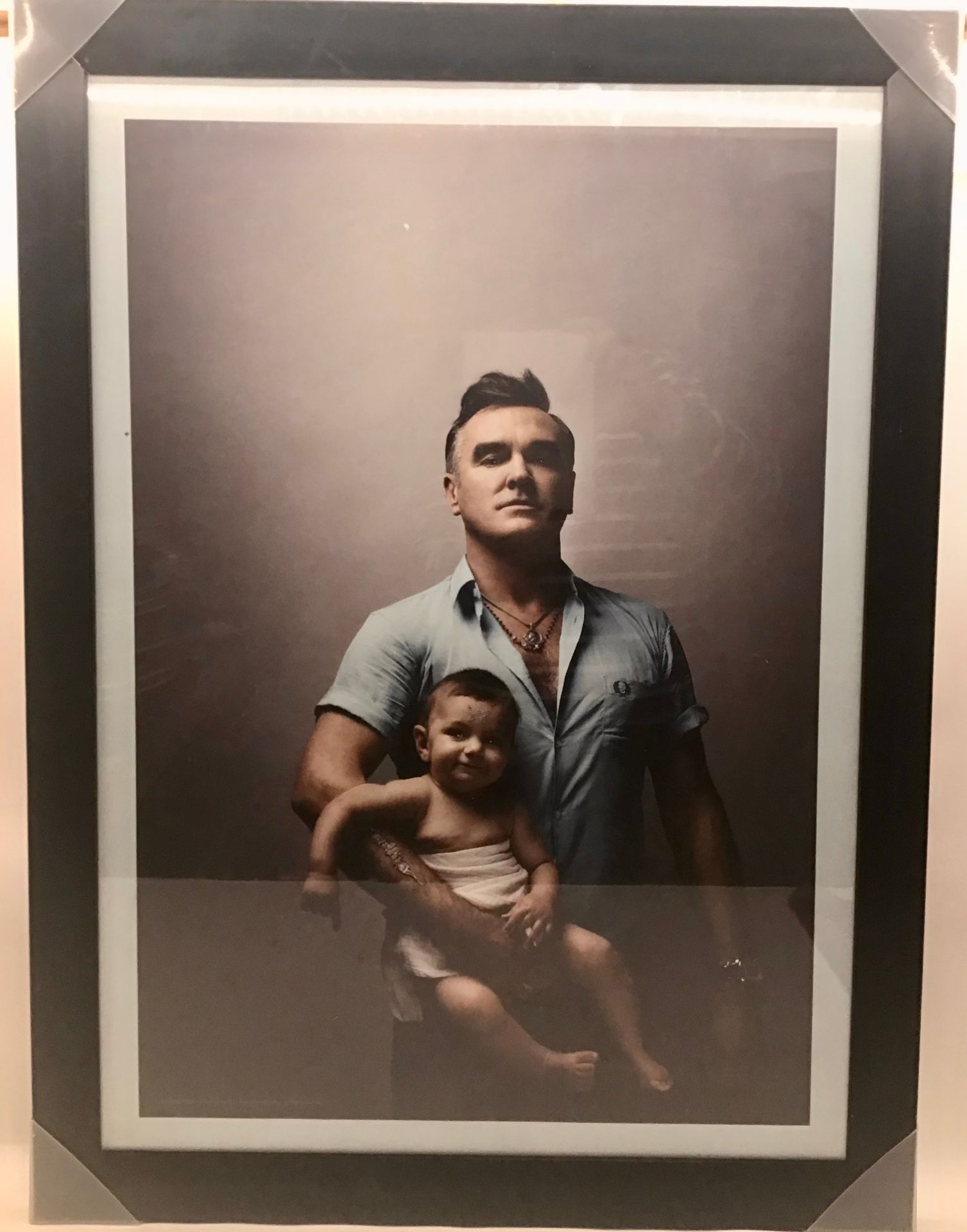 MORRISSEY WITH BABY POSTER. From the album cover ‘Years Of Refusal’ this framed poster measures 57 x
