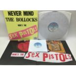 SEX PISTOLS ‘NEVER MIND BOLLOCKS’ 30TH ANNIVERSARY LP. This is an unplayed vinyl album complete with