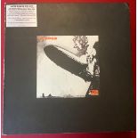 LED ZEPPELIN SUPER DELUX BOX SET. This set includes: - Original Album, 1 CD & 1 LP (180g) in replica