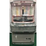 BAL AMI I200 JUKEBOX. Finished with internal pink trim. Chrome work looks in nice condition.