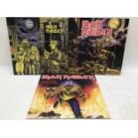 IRON MAIDEN SINGLES X 3. Titles here include - The Number Of the Beast - Women In Uniform and