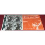 2 ALBUMS BY THE SMITHS. Meat Is Murder and Louder Than Bombs. These vinyls are both in VG+