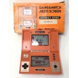 Nintendo vintage 1980's Game & Watch Multi Screen Donkey Kong video game DK-52 with box.