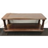 A mahogany coffee table 67x140x54cm.