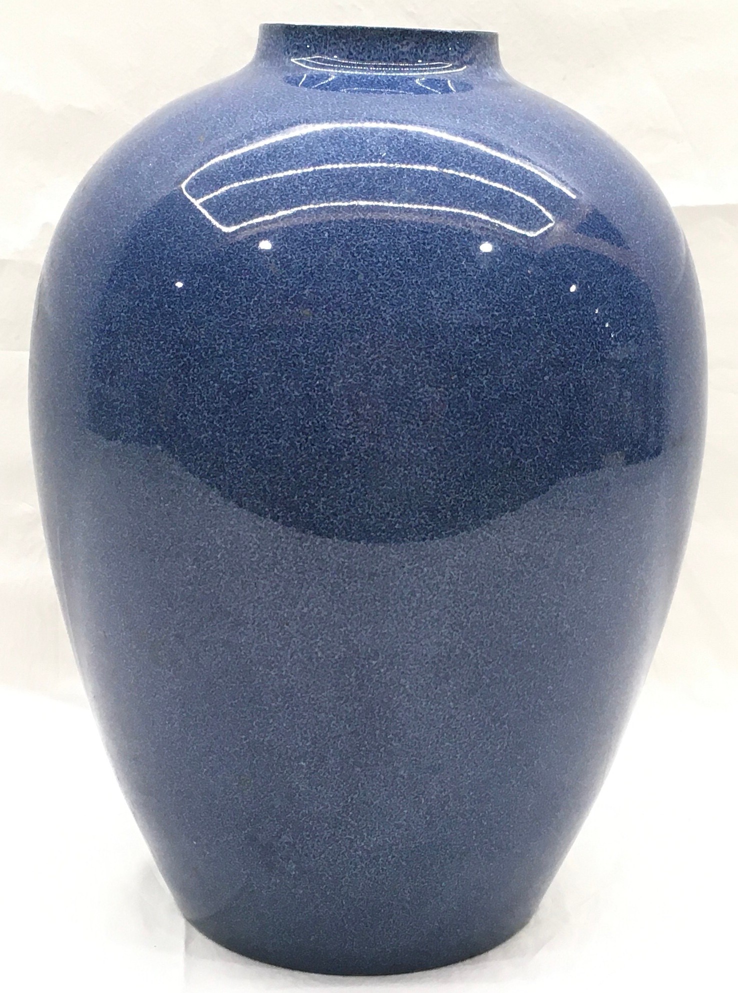 Large Royal Doulton vase in baluster form with blue crackle glaze decoration. Approx 12.5" tall