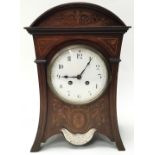 Antique mahogany cased clock with decorative inlay decoration and presentation plaque to front