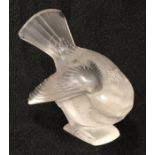 R. Lalique signed frosted glass paperweight figure of a crouched sparrow cleaning beneath its