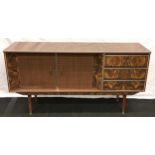 1950s retro Formica laminate sideboard having 3 draws and 2 cupboards on tapering legs80x150x40cm.