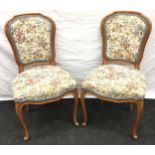 Pair walnut parlour chairs set on cabriole legs over pattern material back and seat 90x50x50cm