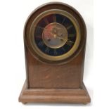 Large antique oak cased chiming bracket clock seen in working condition with pendulum, no key.