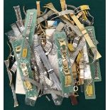 Large collection of assorted wristwatch straps. Some still sealed in packaging.