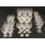 Large quantity of stemmed crystal drinking glasses (33).