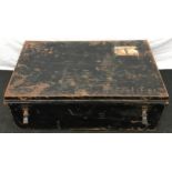 Vintage black painted metal shipping trunk with period "Cunard" stickers still attached.