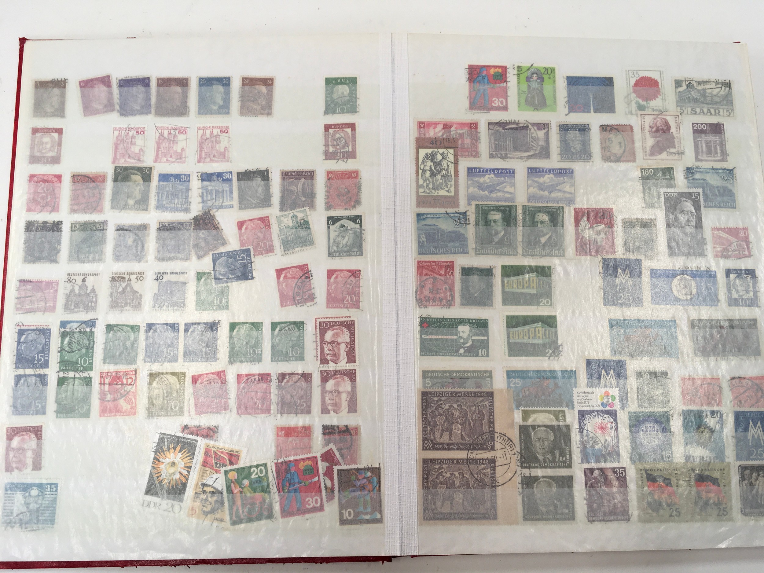 Red album containing German stamps. - Image 2 of 9