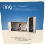 Ring door view cam in original box. Untested
