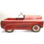 Vintage Tri-Ang 'Lightning' pedal car. Some decals missing but general wear acceptable