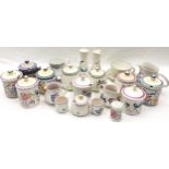 Large collection of Poole Pottery consisting of Lidded pots, Milk jugs, salt & pepper shakers and