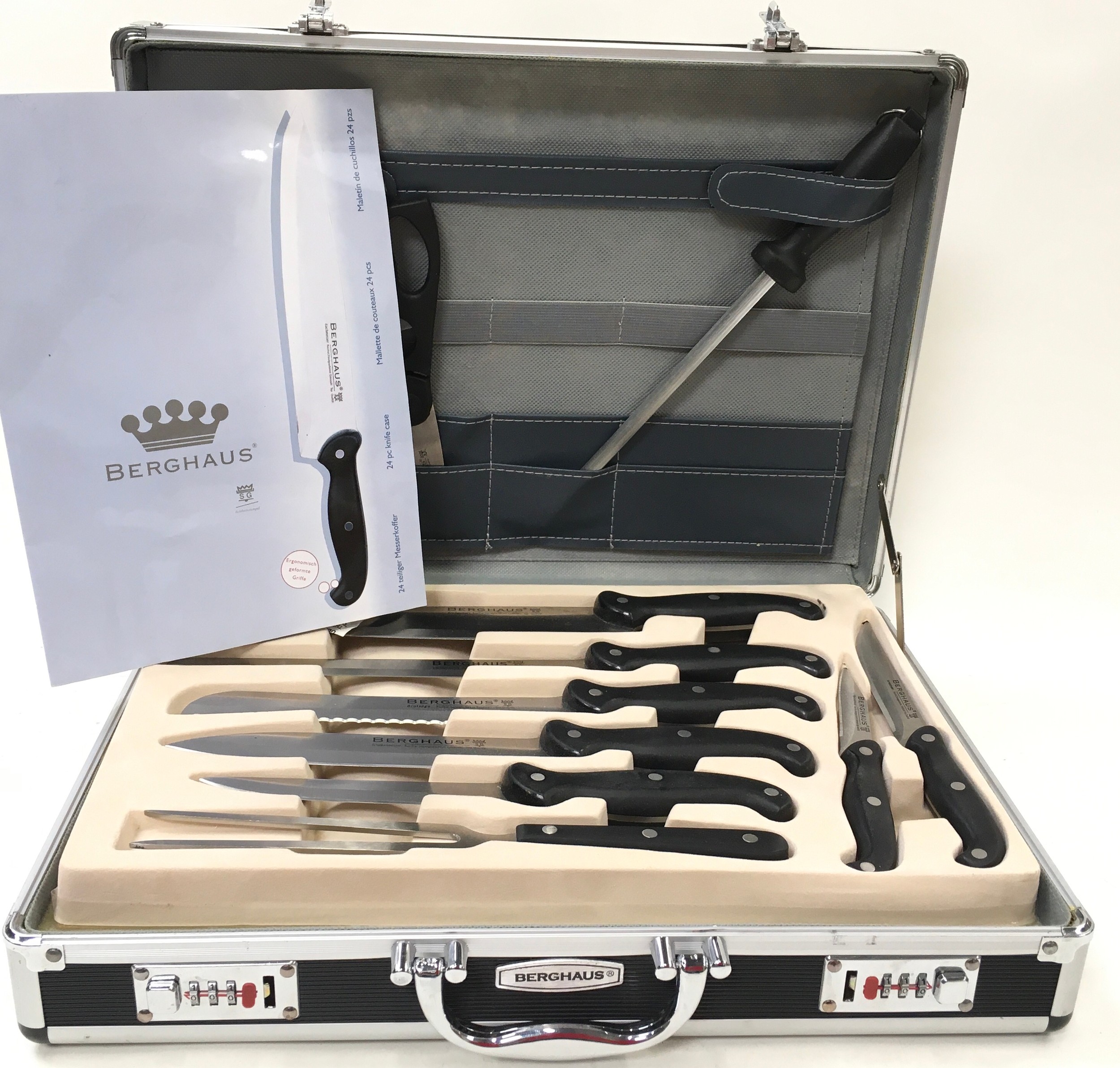 Quality Berghaus 24 piece knife set housed in a combination lock aluminium briefcase