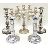 A silver plated 6 branch candelabra together with two pairs of candlesticks.