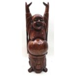 Large wooden figure of a laughing Buddha with outstretched arms. Approx 18" tall