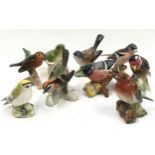 Selection of ceramic bird figurines to include Beswick and Goebel examples. 9 in lot