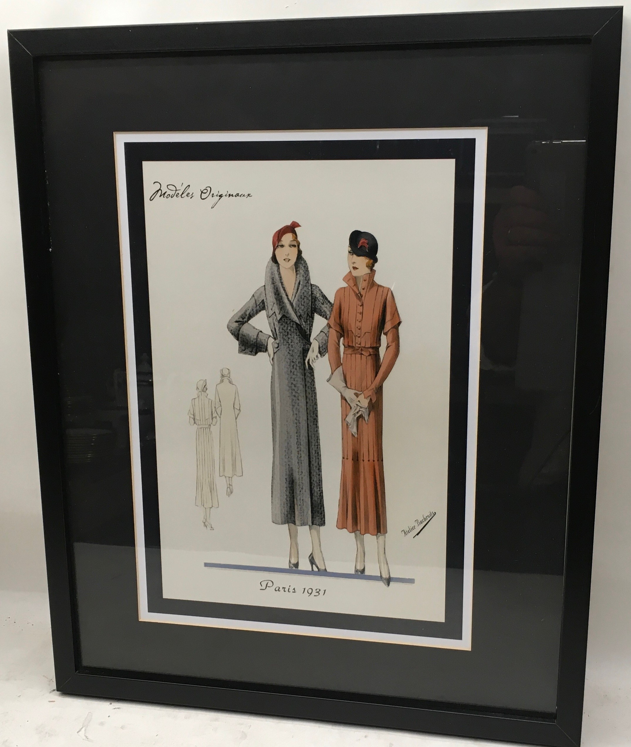 Pair of framed prints depicting early 20th century French fashion. Overall frame size 21" x 17" - Image 2 of 4