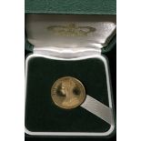 9ct gold representation of the elusive 1847 Victoria Gothic Crown. 22mm across and weighing 7.3g.