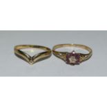 2 9ct gold diamond set rings 1 set with rubies