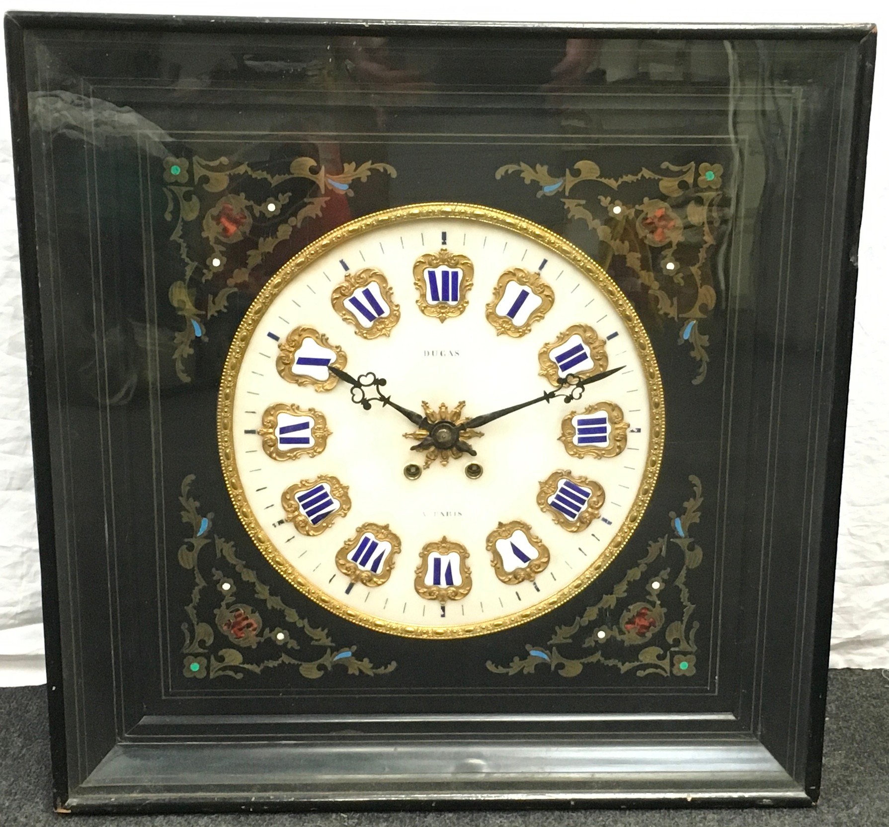 Quality wall clock with gilded enamel hour markers, signed Dugas a Paris to dial. Housed in a glazed