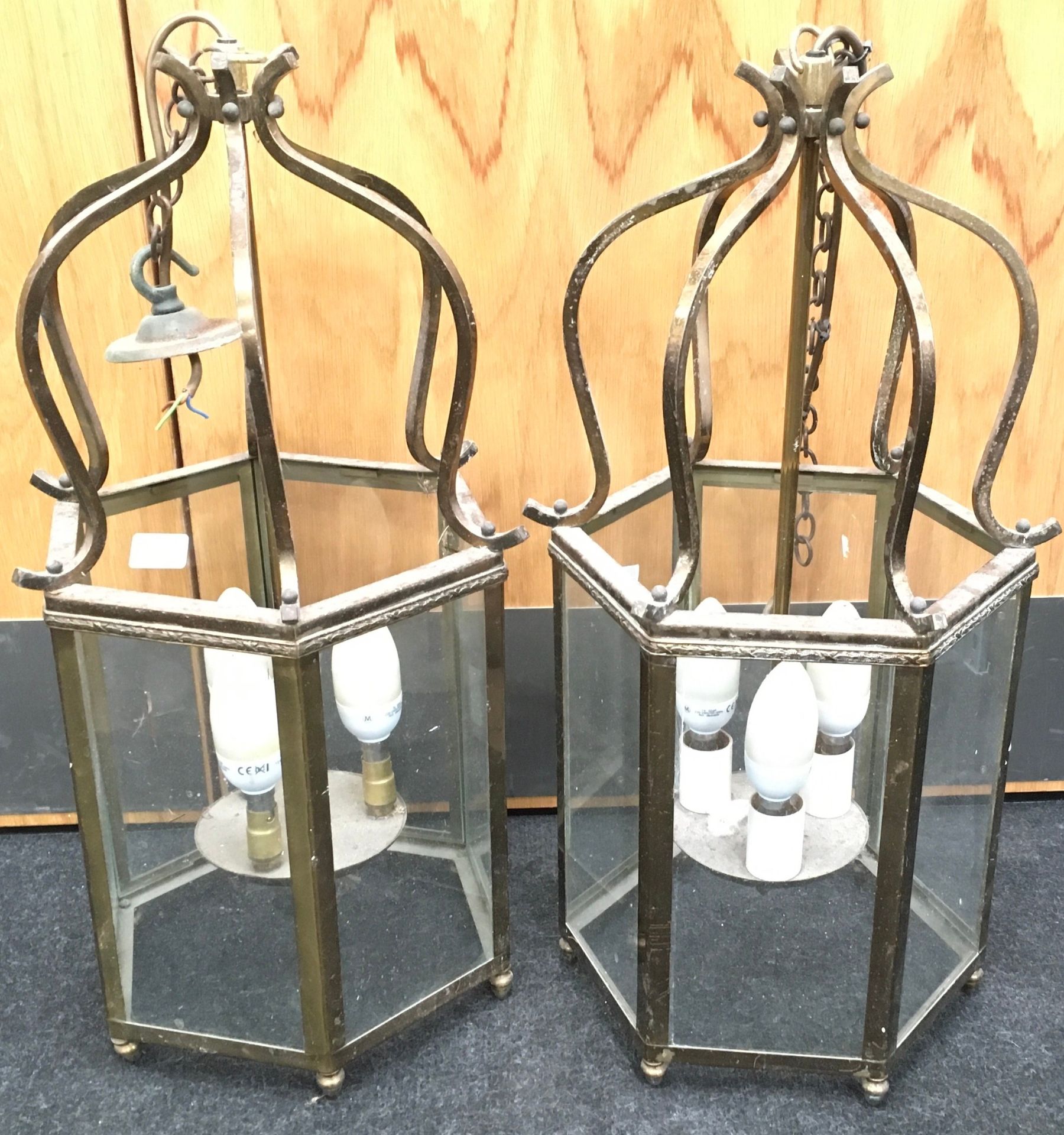 Pair of large hexagonal brass suspension lamps with glass panels. Each approx 22" tall