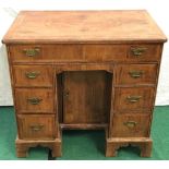 Antique mahogany ladies kneehole writing desk with one long over 2x3 drawers and central locking