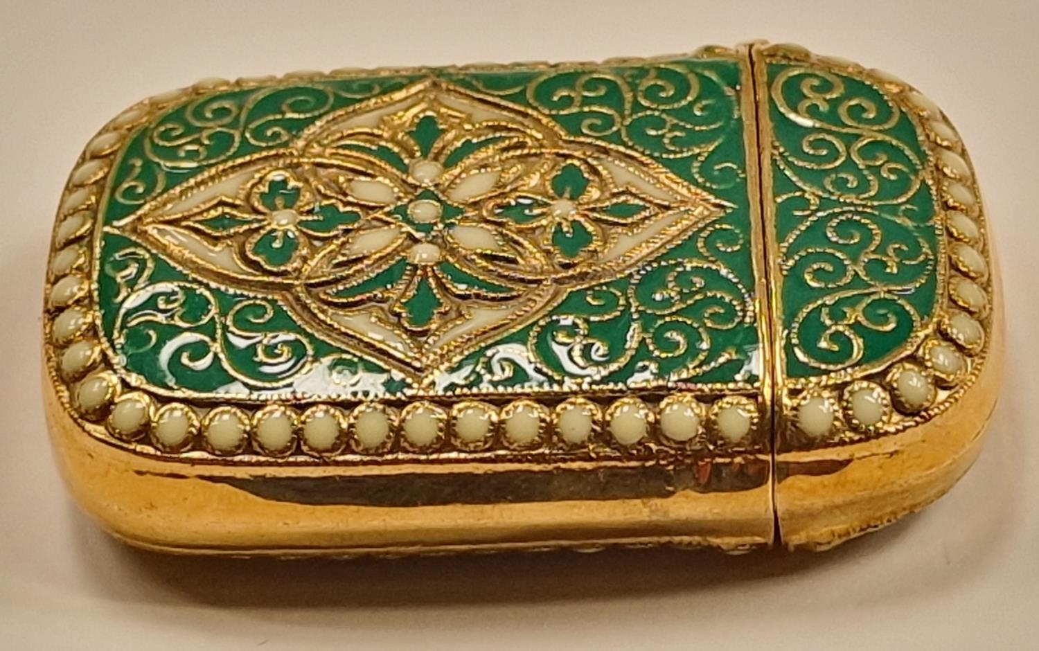 A brass cased Anderson style vesta with enamel decoration. - Image 2 of 6