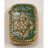 A brass cased Anderson style vesta with enamel decoration.