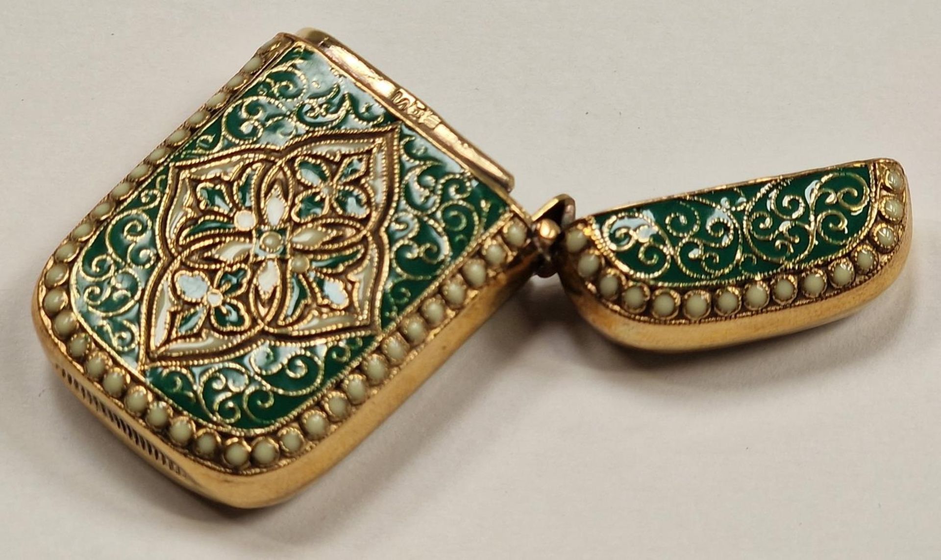 A brass cased Anderson style vesta with enamel decoration. - Image 5 of 6