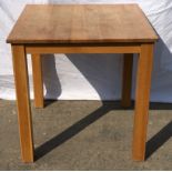 Light oak square kitchen table. 77x77x77cms.