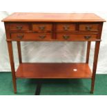 Vintage mahogany hall table on tapered square legs with four over two drawer configuration and