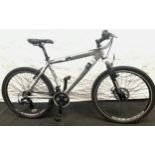 A Diamond back park trail 05 silver bicycle with 18 gears and frame size 18.5"/47cm