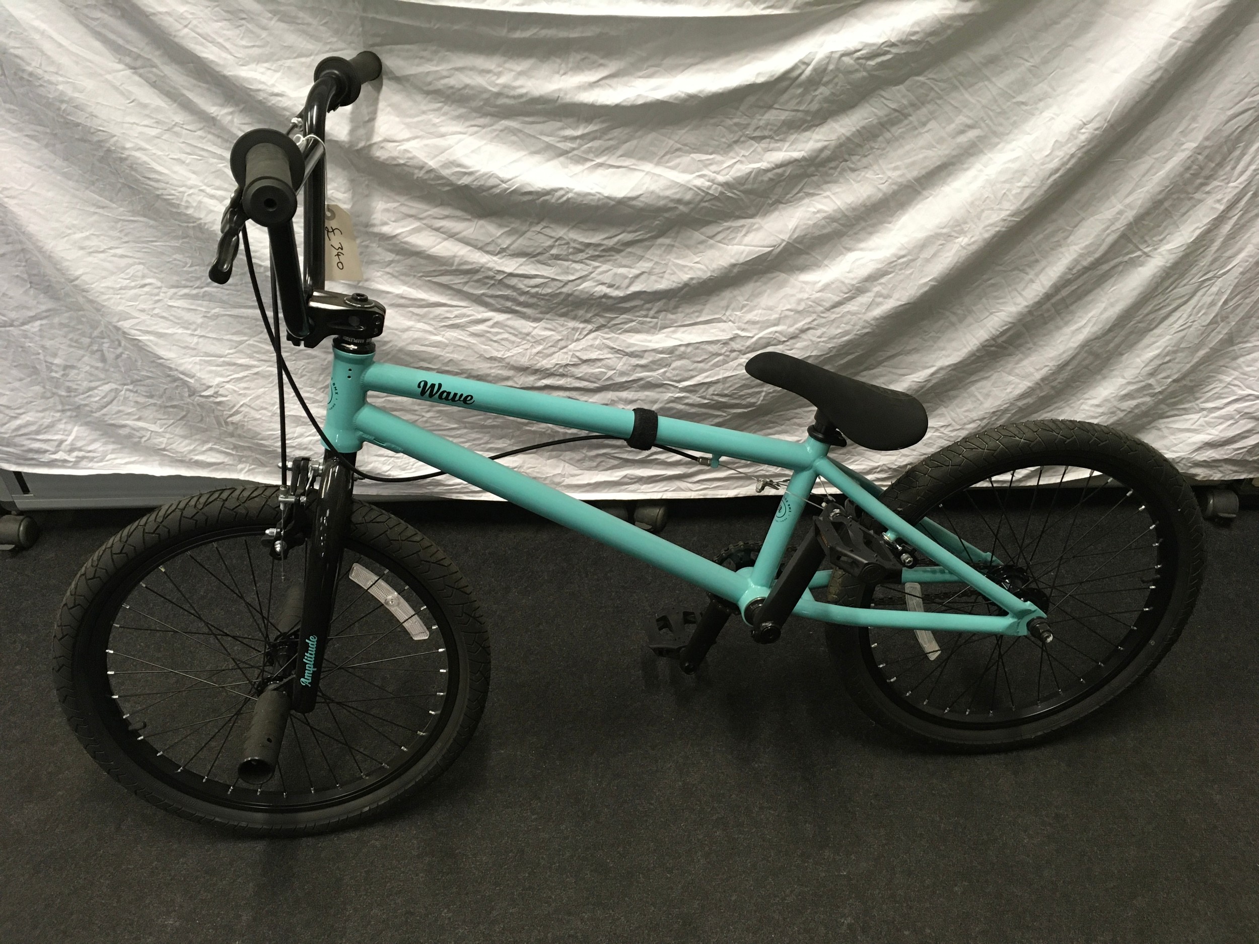 An Amplitude Wave BMX, wheel size 20 inch. RRP £340