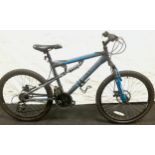 A Muddyfox grey bike with shimano gears x 18, frame size 17"/43cm