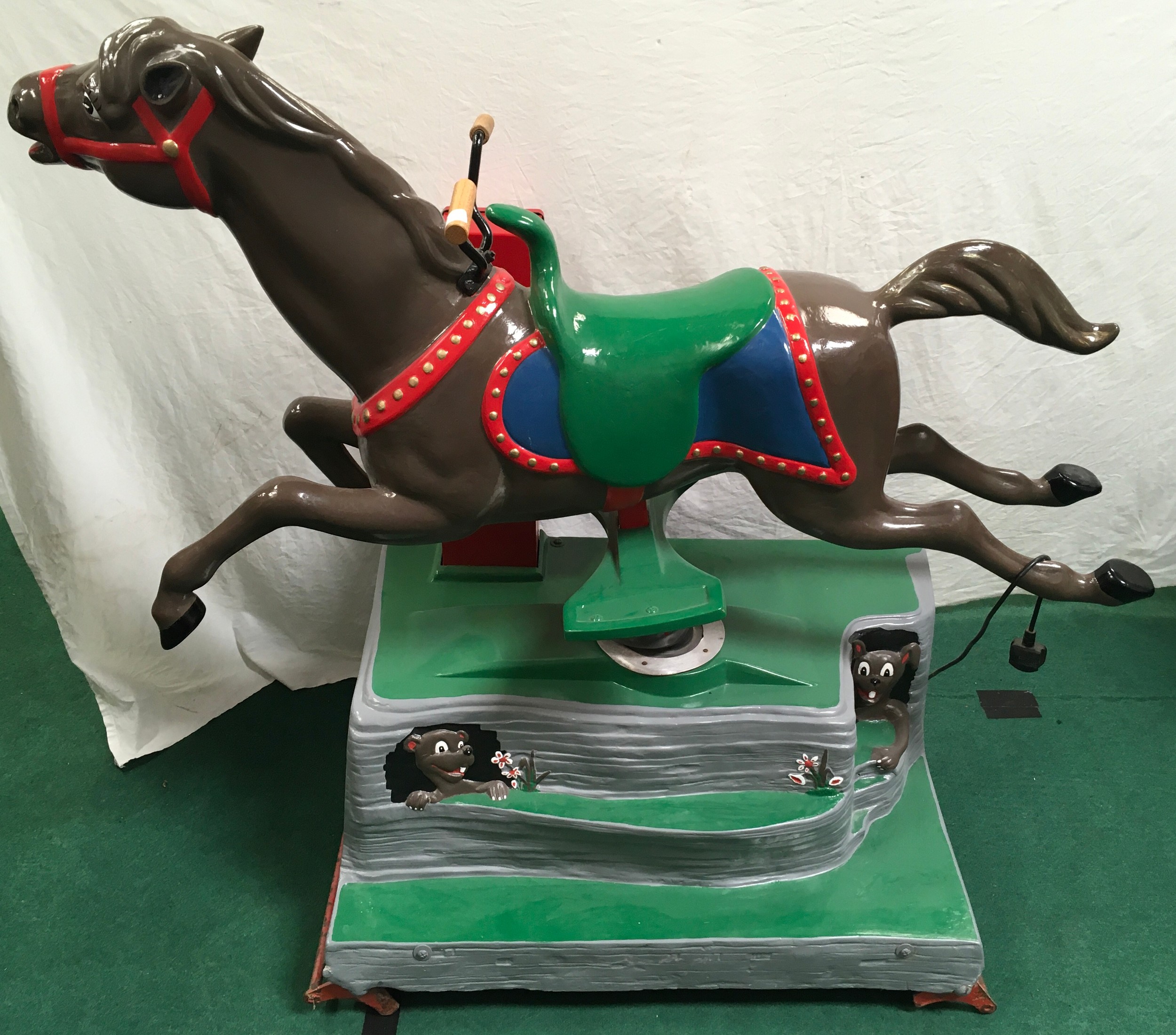 Coin operated ride on horse.