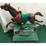 Coin operated ride on horse.
