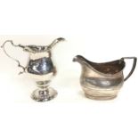 2 Georgian silver jugs.