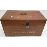 A large wooden box of ephemera, wooden items etc.