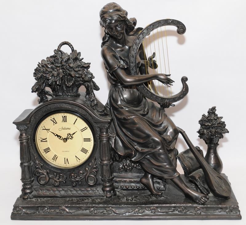 Large bronzed resin mantle clock featuring a classical Muse. 53cm across